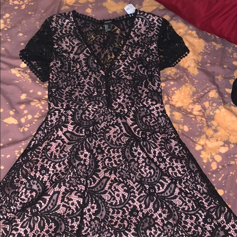 light pink with black lace dress. see throu back